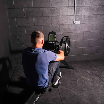 Gym Gear Row Max 2.0 rowing machine view of a man on the rowing machine