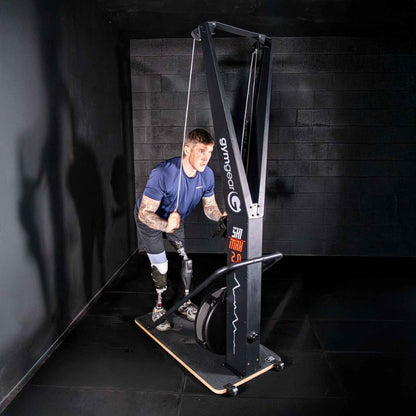 Gym Gear Ski Max 2.0 ski machine view of a man with prosthetic legs using the ski machine
